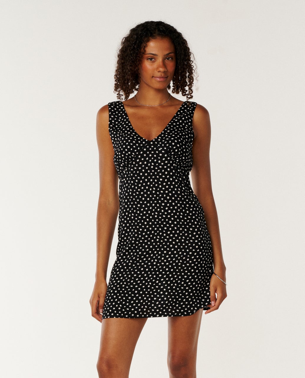 Rip Curl Lara Spot Mini Dress in black and white, front view