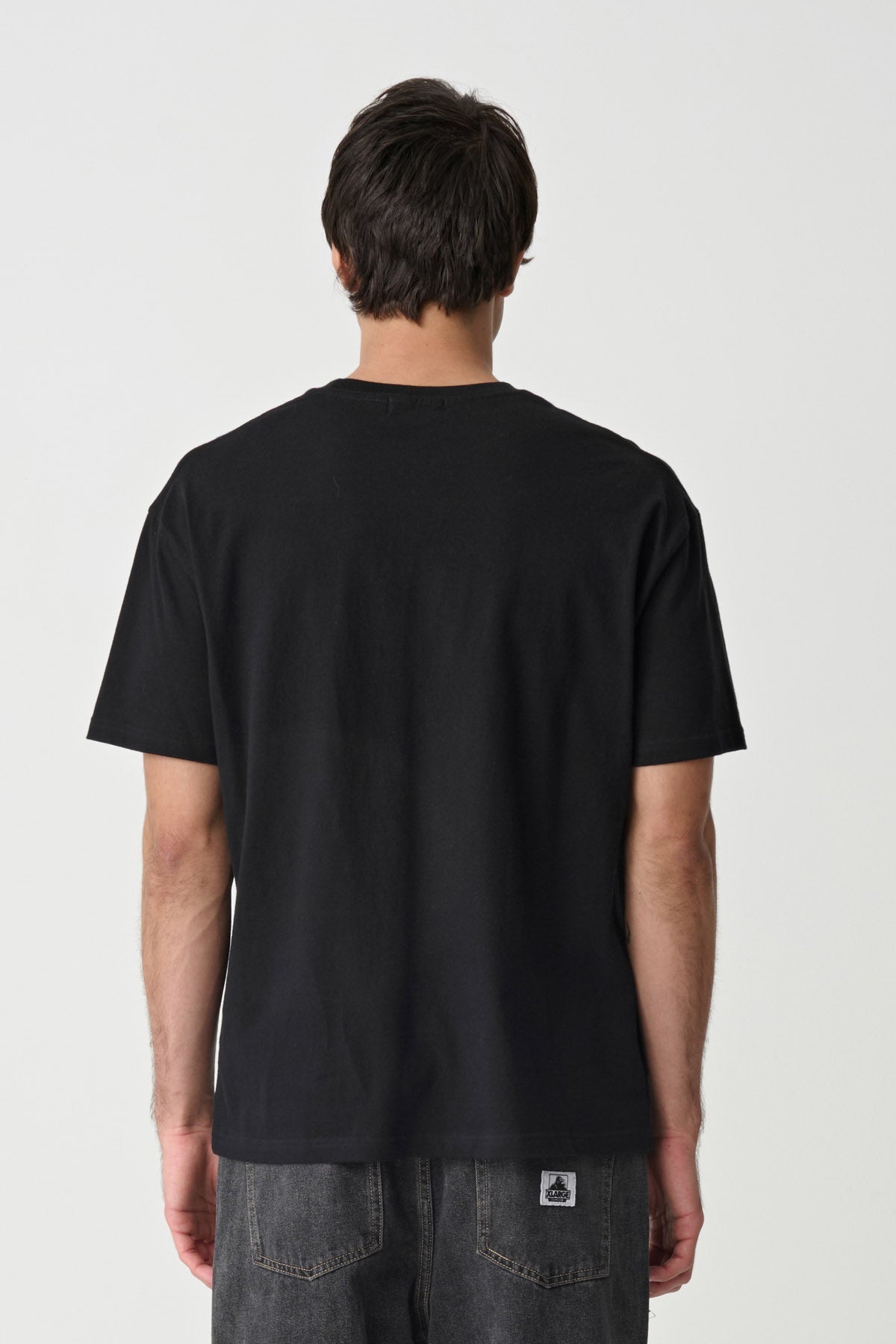 XLARGE 91 SS Tee in solid black - graphic