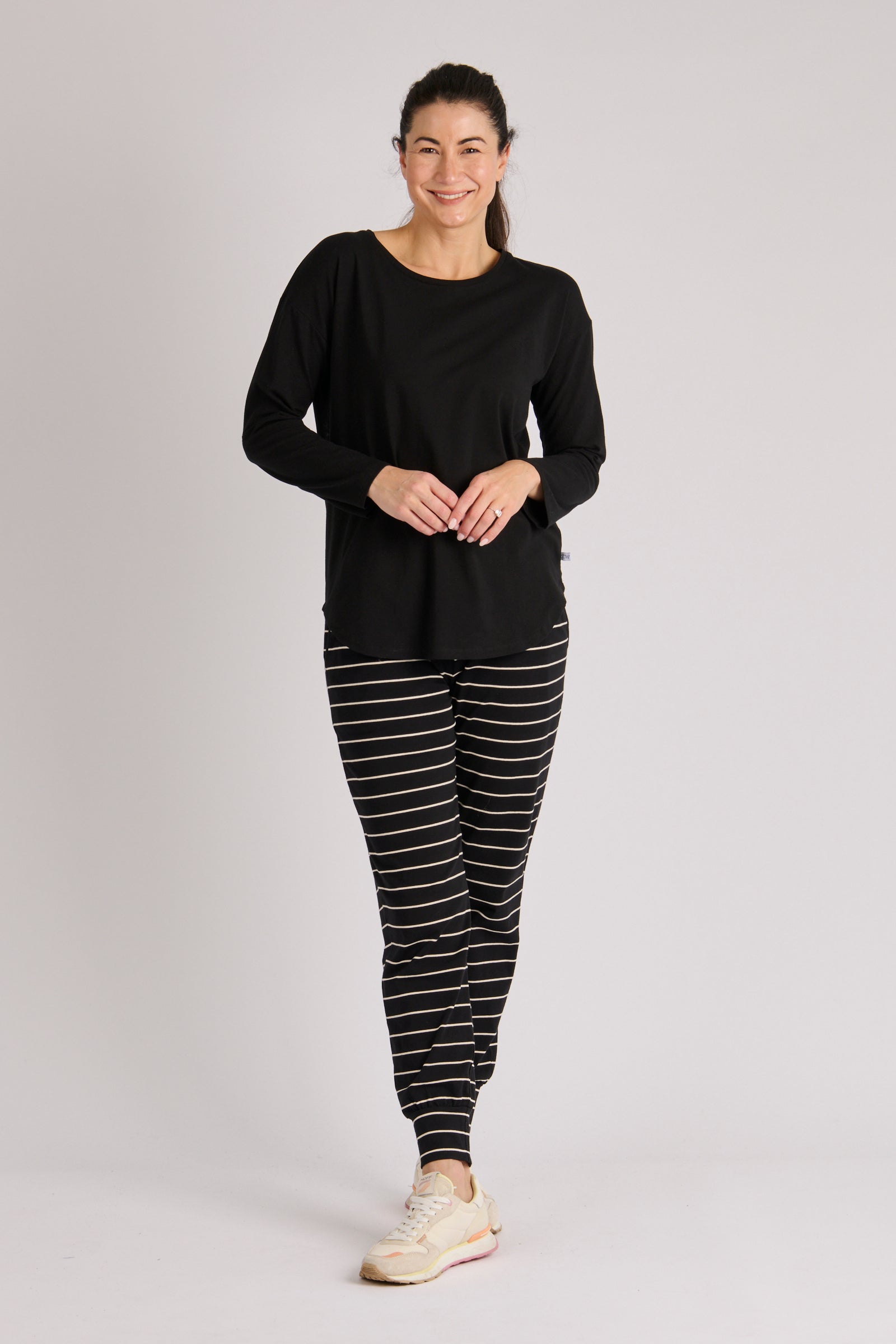 The Laboratory Scoop Hem Long Sleeve Top in black - detail
