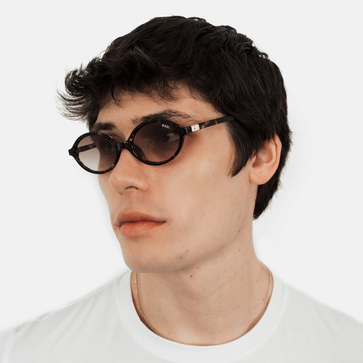 ROC Reboot sunglasses in tortoiseshell with smoke gradient lens, worn