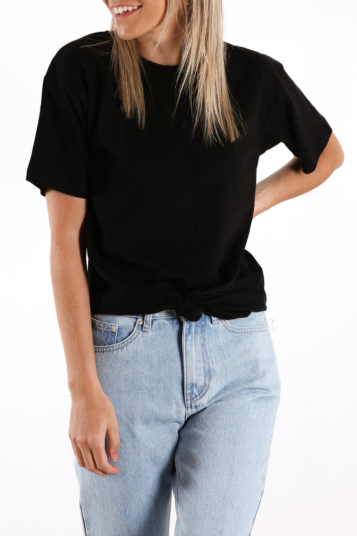 Silent Theory Downtown tie tee in black, styled with denim