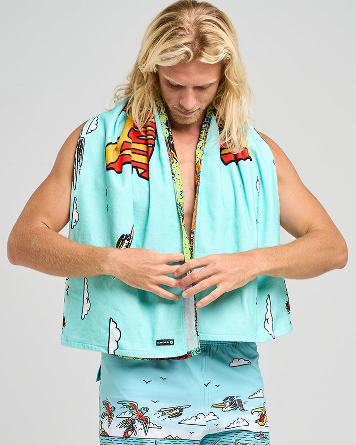 The Mad Hueys Oz Straya Beach Towel Aqua - lifestyle view