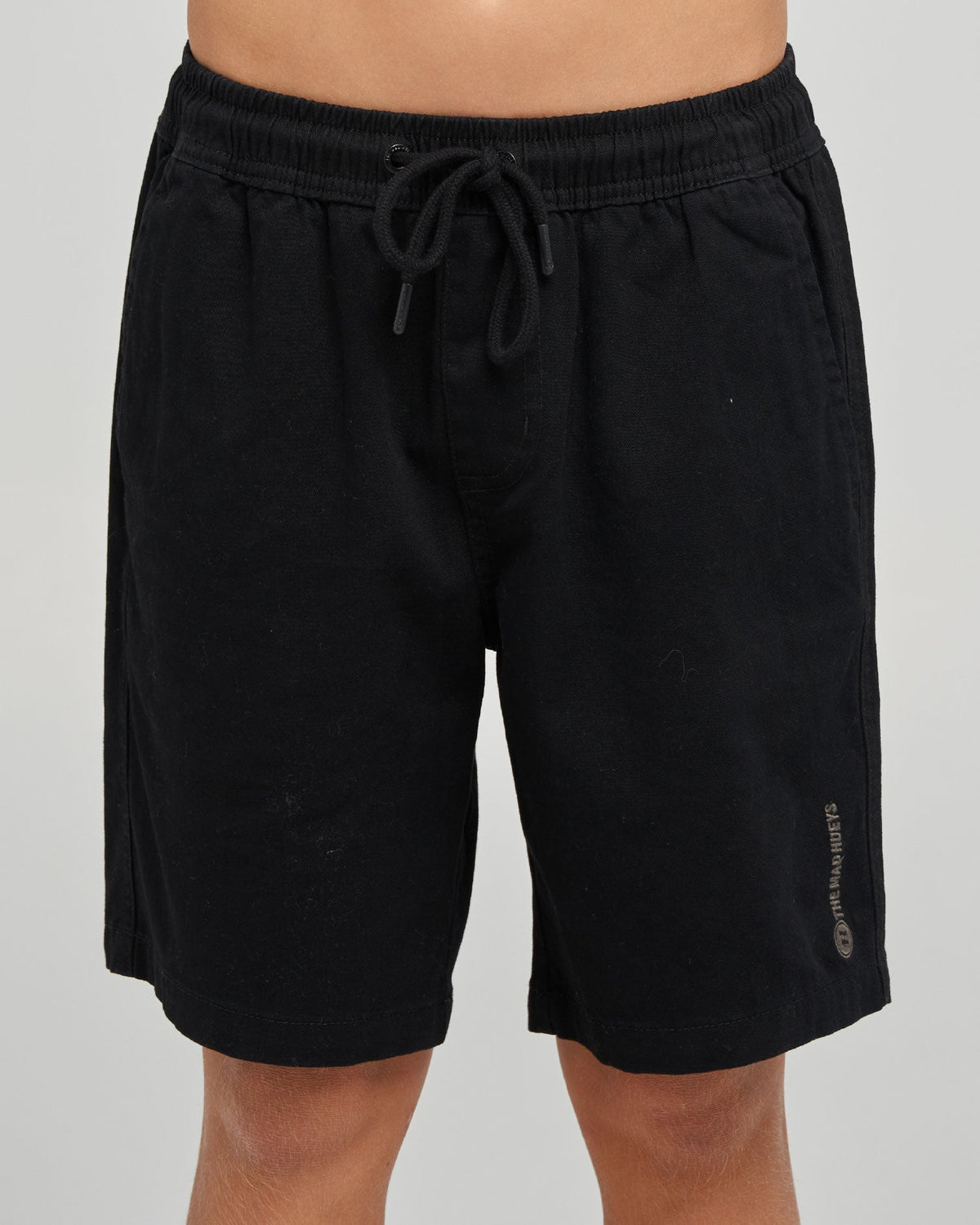 Black youth chino short back view