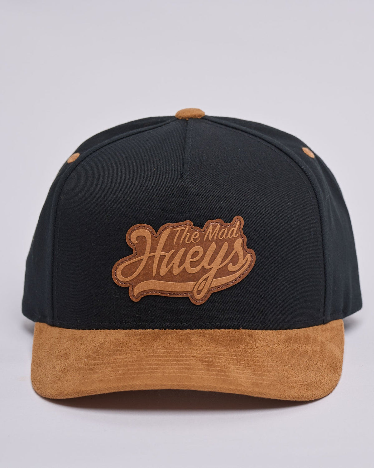 The Mad Hueys Hueys Ball twill snapback cap in black with tan brim