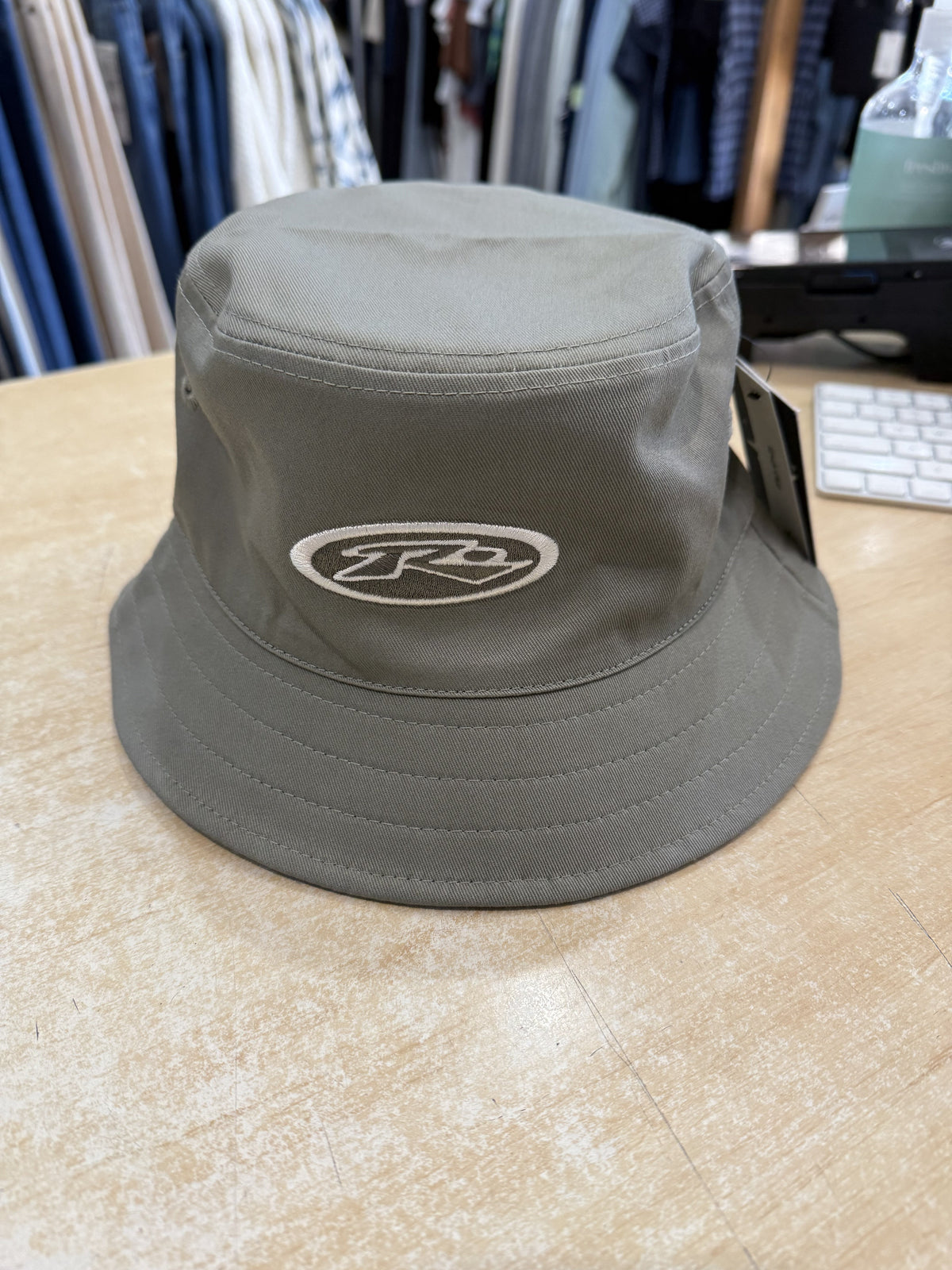 Rusty Kick Flip reversible bucket hat in abbey stone