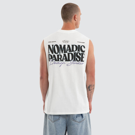 Person wearing a sleeveless shirt with 'Nomadic Paradise' text on the back, standing against a plain background.