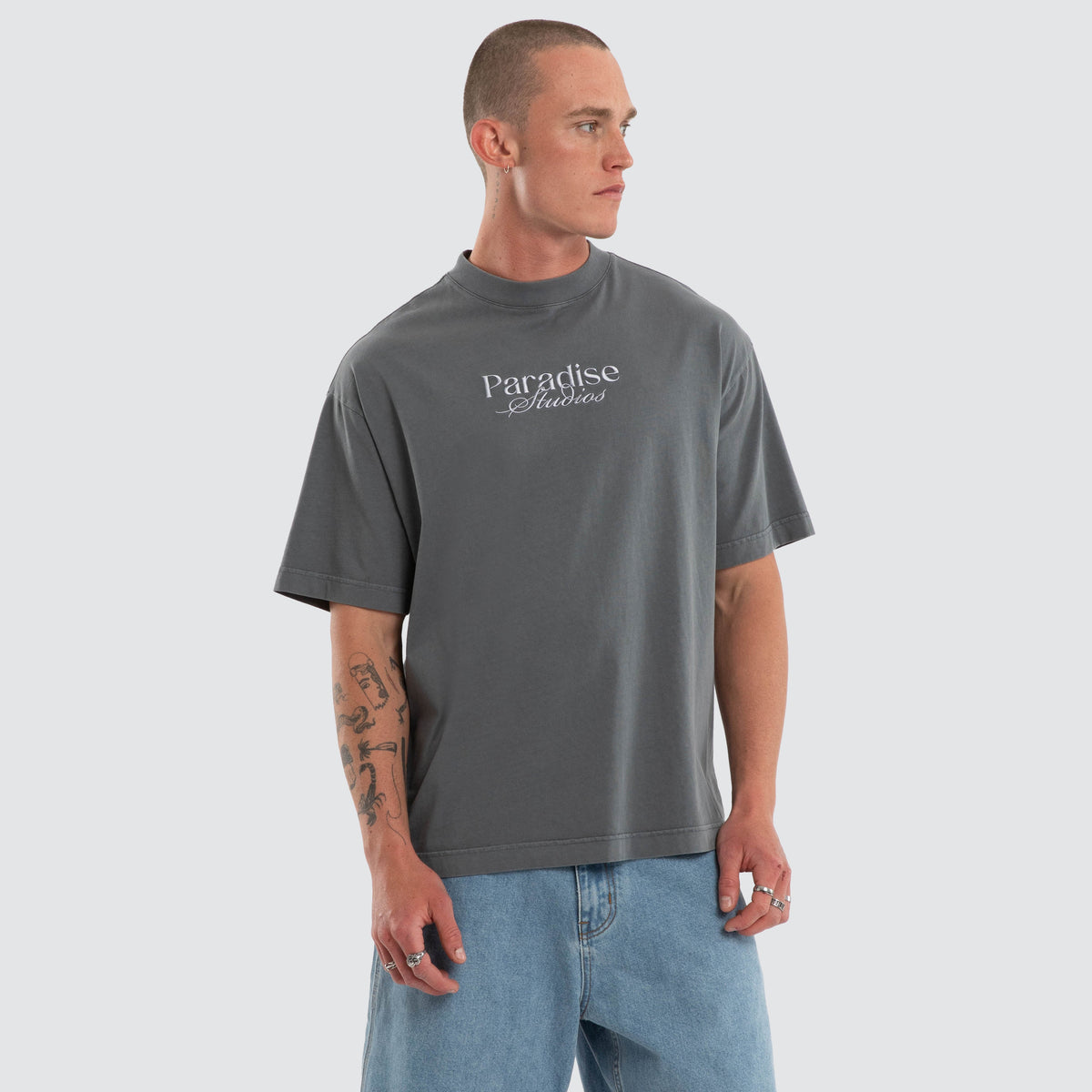 Nomadic Merch street tee in pigment dark slate, front view